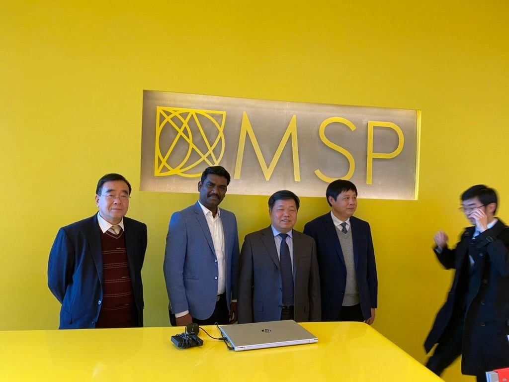 Guires representative with delegates at the MSP reception in Manchester
