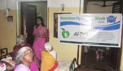 Elderly residents listening to a nutrition and hydration talk