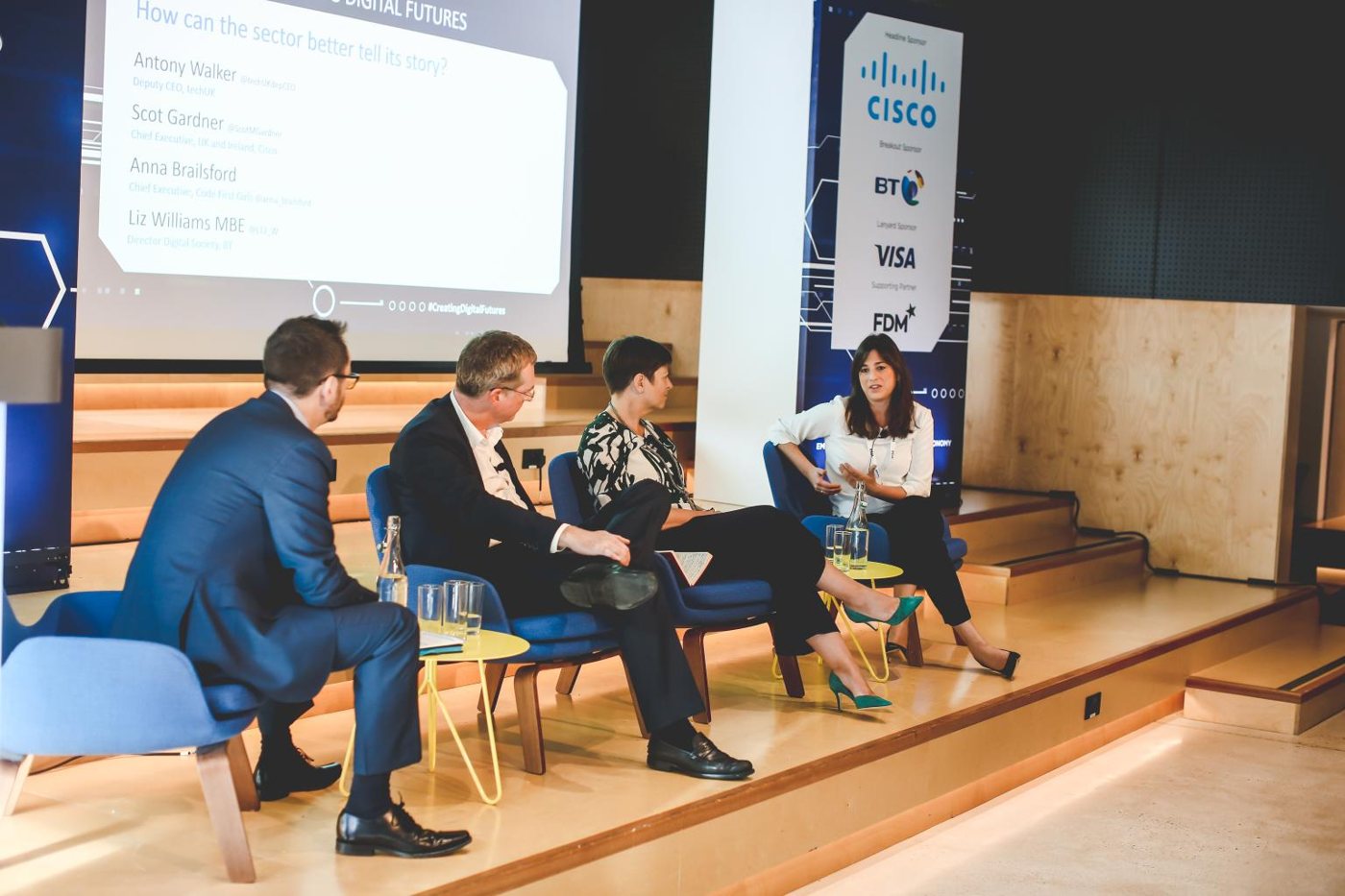 Panel discussion on stage at techUK Creating Digital Futures
