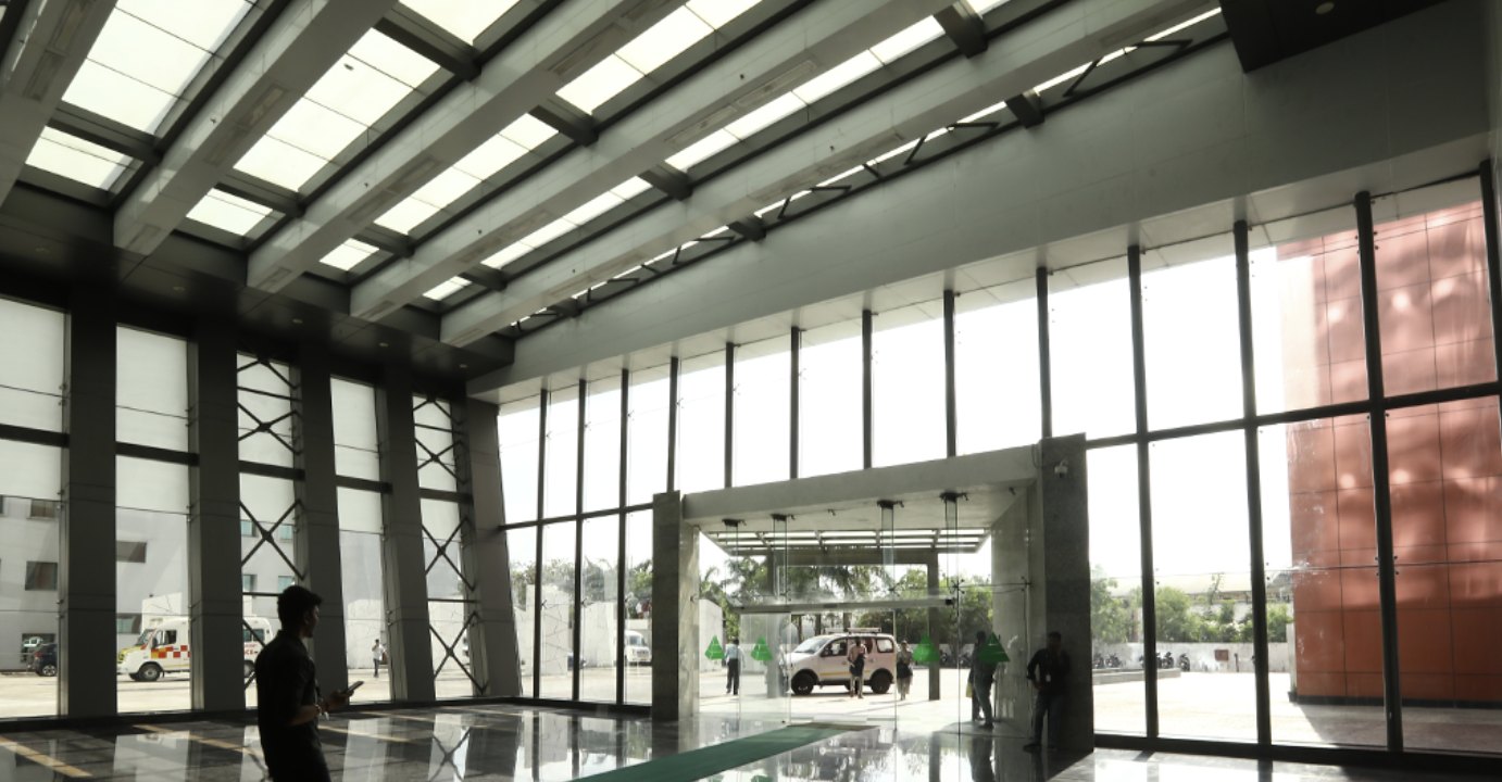 Glass-fronted entrance lobby of TICEL Bio Park, Taramani